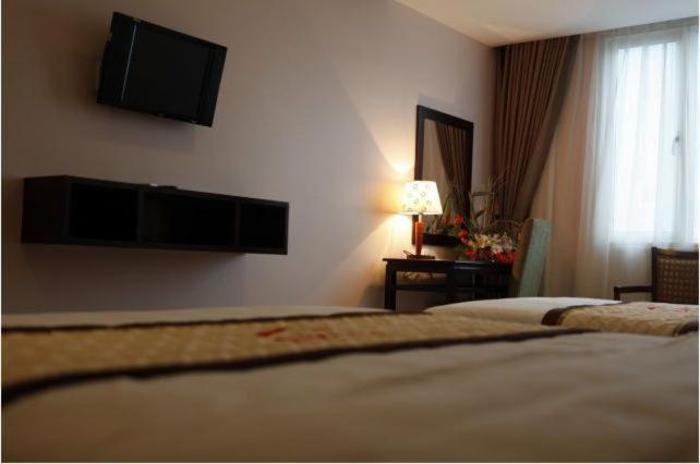 Hue Smile Hotel Rum bild